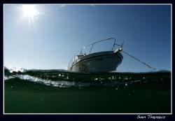 Back to the boat on a very bright day after a nice dive by Sven Tramaux 